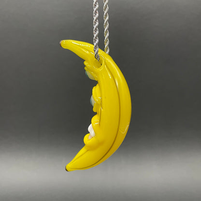 Grinning glass banana pendant