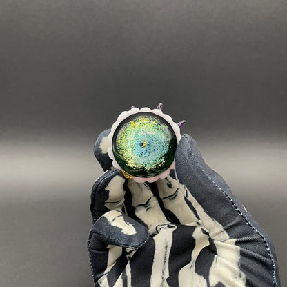 Close-up of Hungry Dichroic marble - handcrafted glass