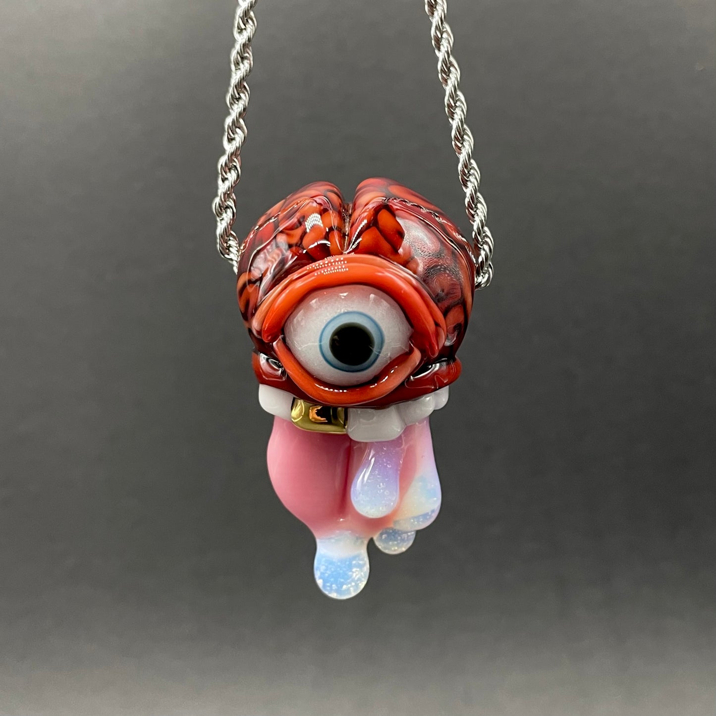 Hand-blown glass Mastermind glass pendant by Leviathan Glass