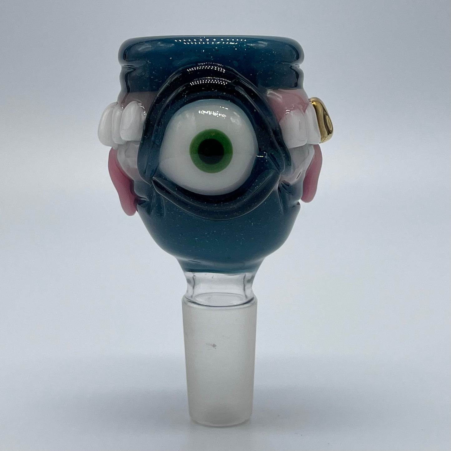 Close-up of 14mm 4 hole Too many teeth slide - handcrafted glass