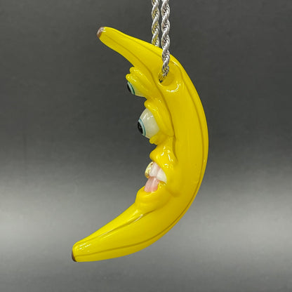 Grinning glass banana pendant