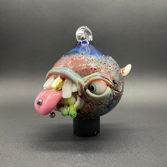 Hand-blown glass Pierced tongue cyclops ornament by Leviathan Glass