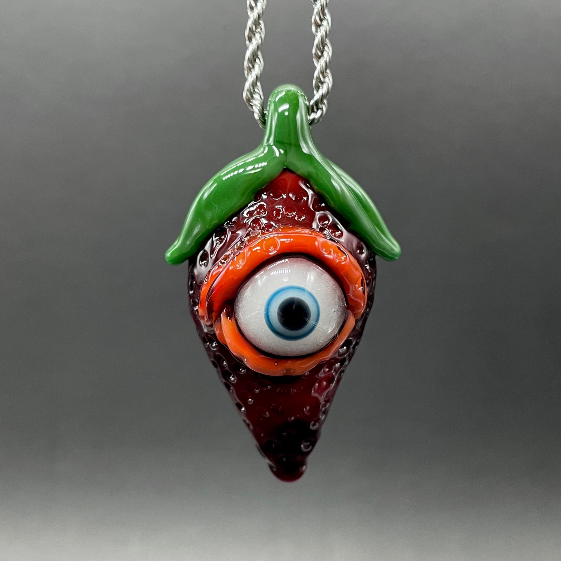Hand-blown glass Cyclops strawberry pendant by Leviathan Glass