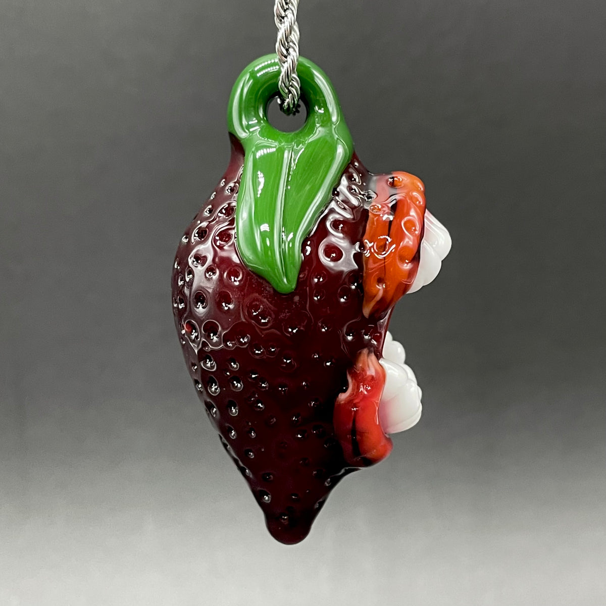 Screaming strawberry glass pendant