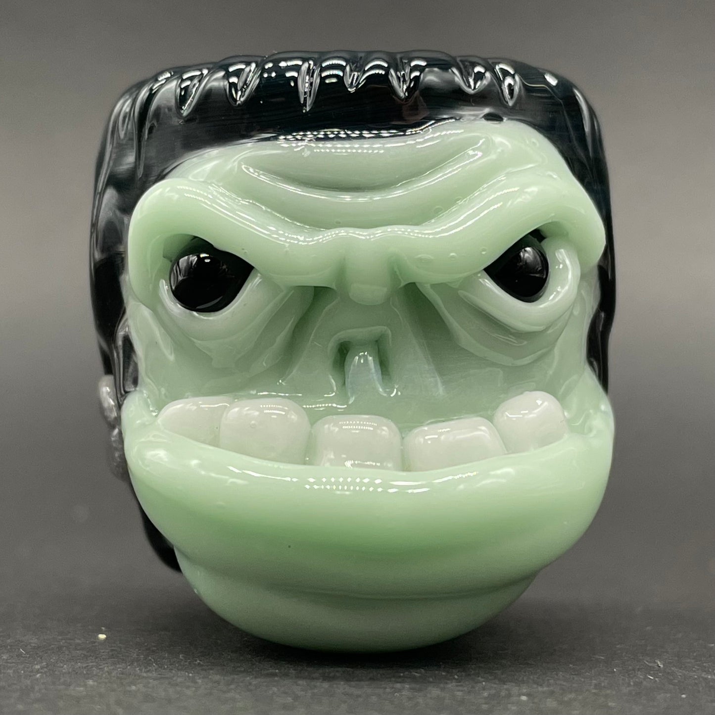 Glass Frankenstein pendant by Leviathan Glass - artisan detail
