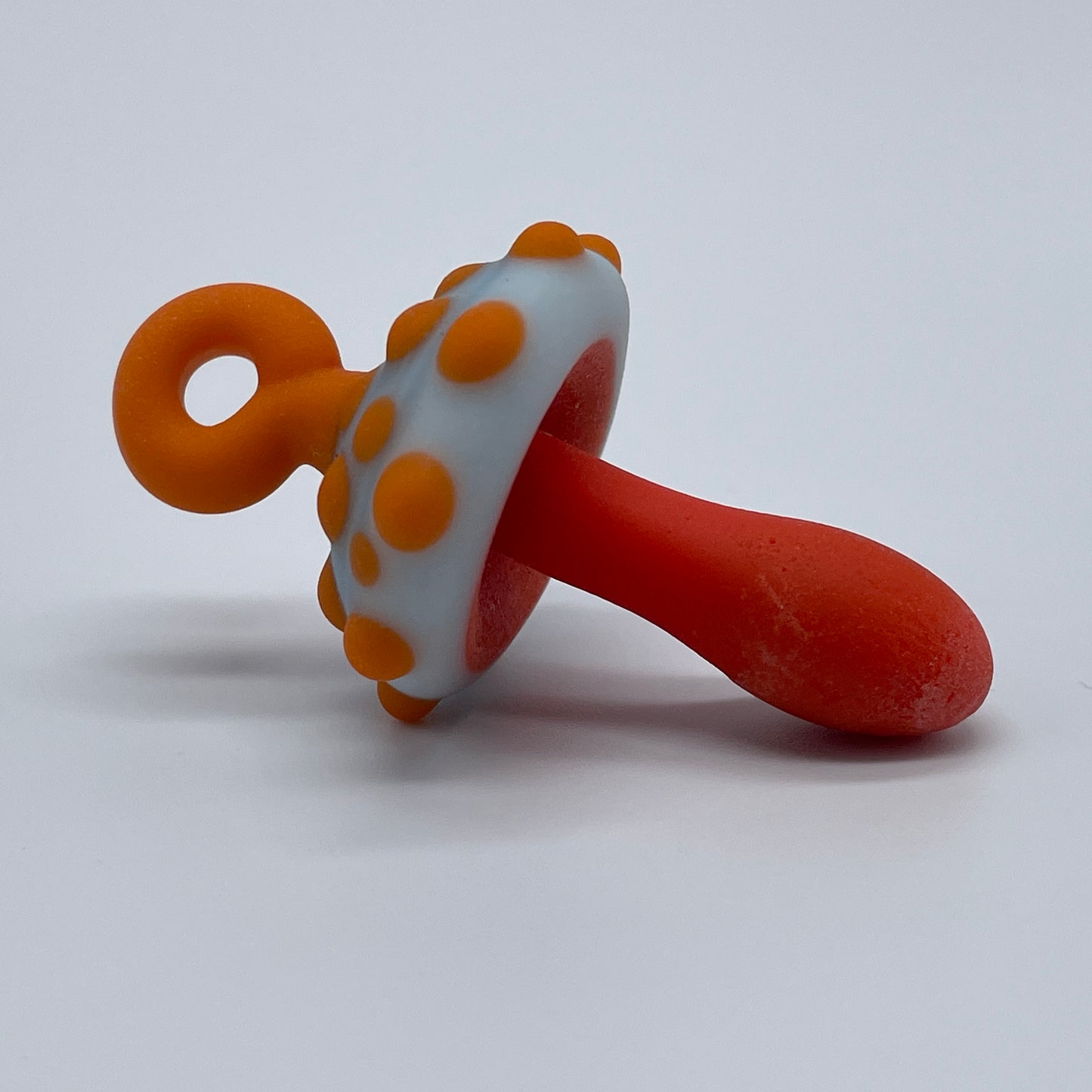 Orange mushroom pendant detail view - premium glass art
