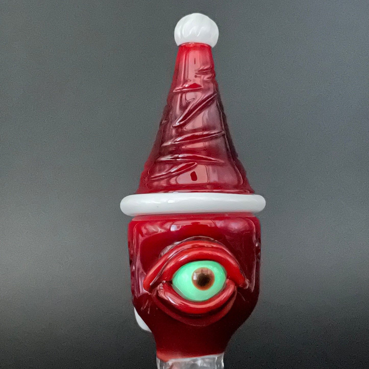 Artisan glass 18mm Cyclopean Santa slide - detailed craftsmanship