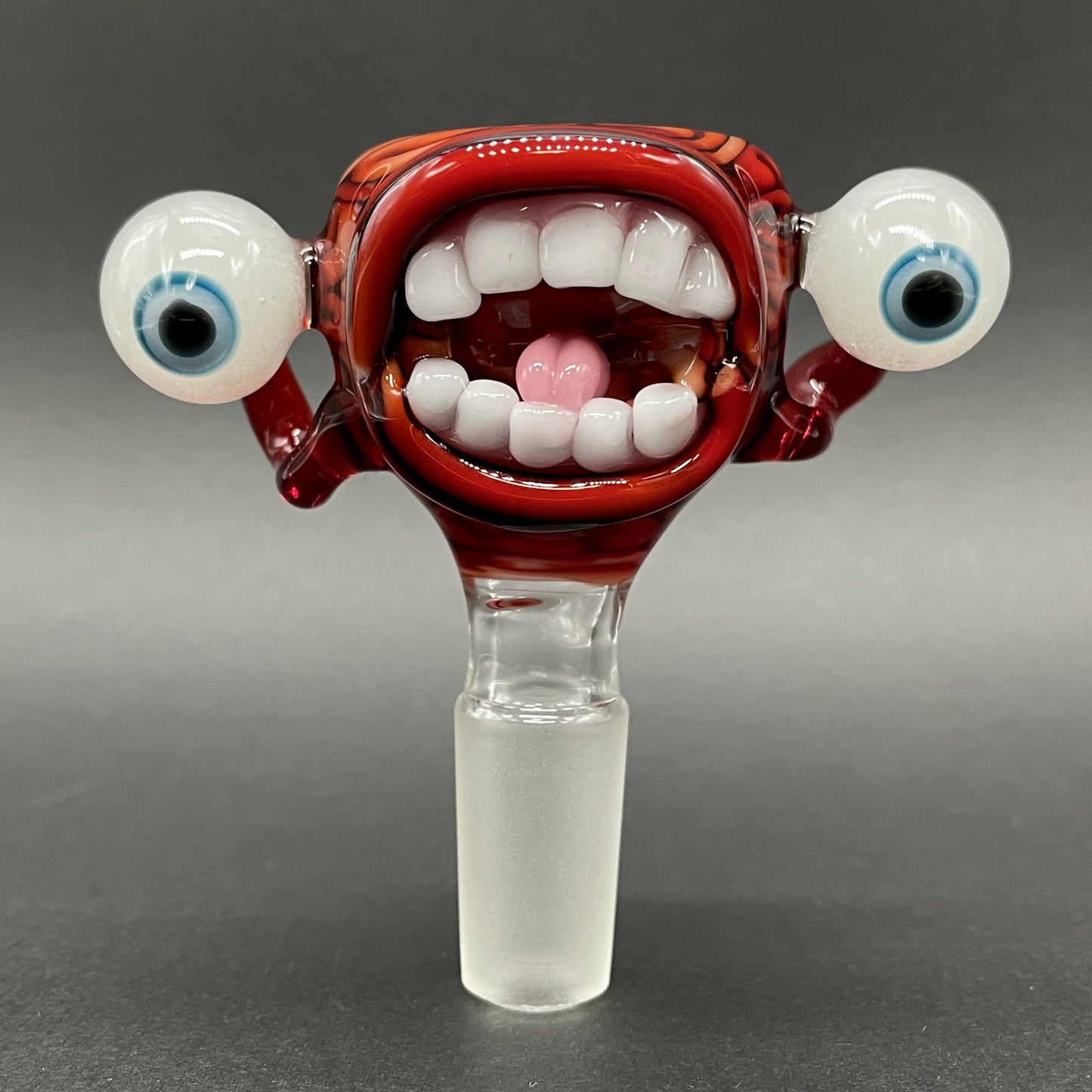 Close-up of 14mm 3 Hole Brain Slide - handcrafted glass