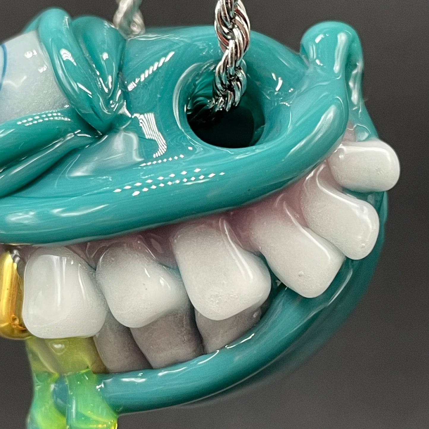 Grinning Like a Fool handblown glass pendant - oversized grinning monster face, white teeth, gold tooth, opal accents, silver rope chain - Leviathan Glass
