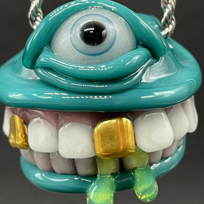 Grinning Like a Fool handblown glass pendant - oversized grinning monster face, white teeth, gold tooth, opal accents, silver rope chain - Leviathan Glass