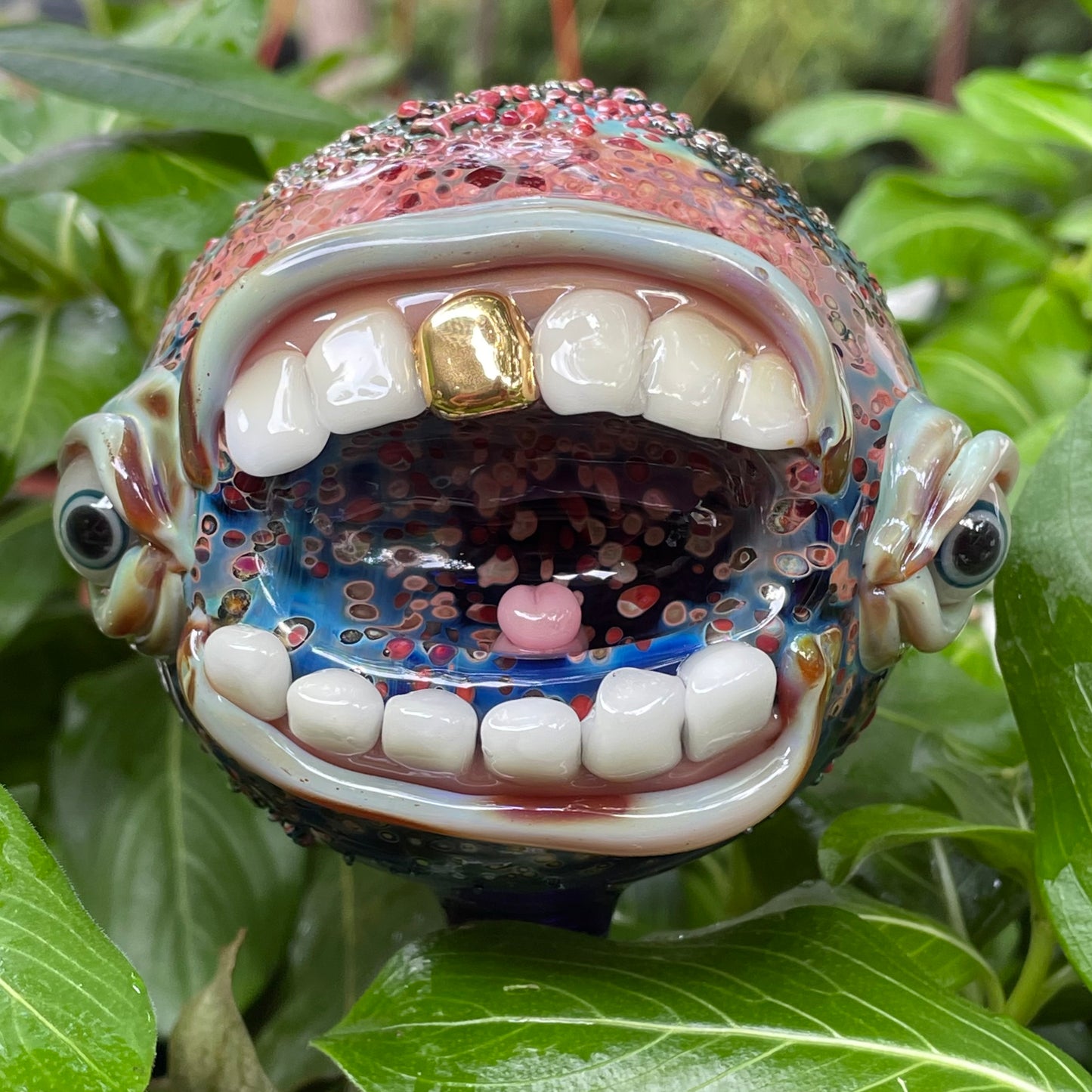 Hand blown glass monster watering globe