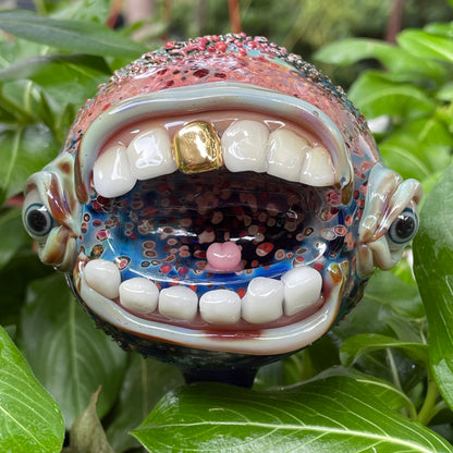Hand blown glass monster watering globe