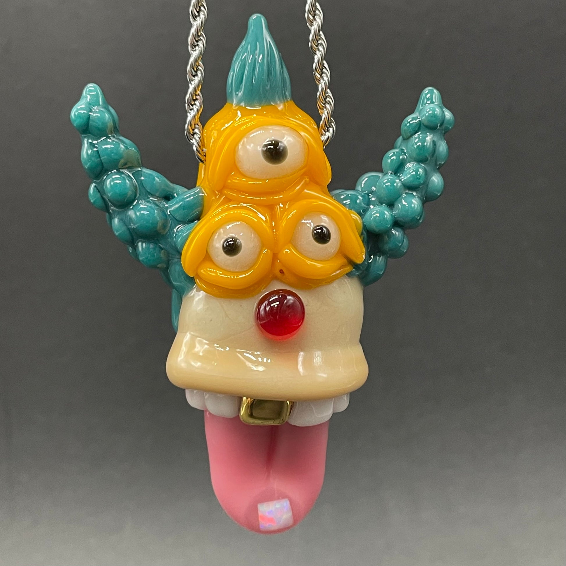 Krusty the Clown handblown glass pendant - Simpsons Krusty clown face with third eye, opal tab accent, white teeth, silver rope chain - Leviathan Glass