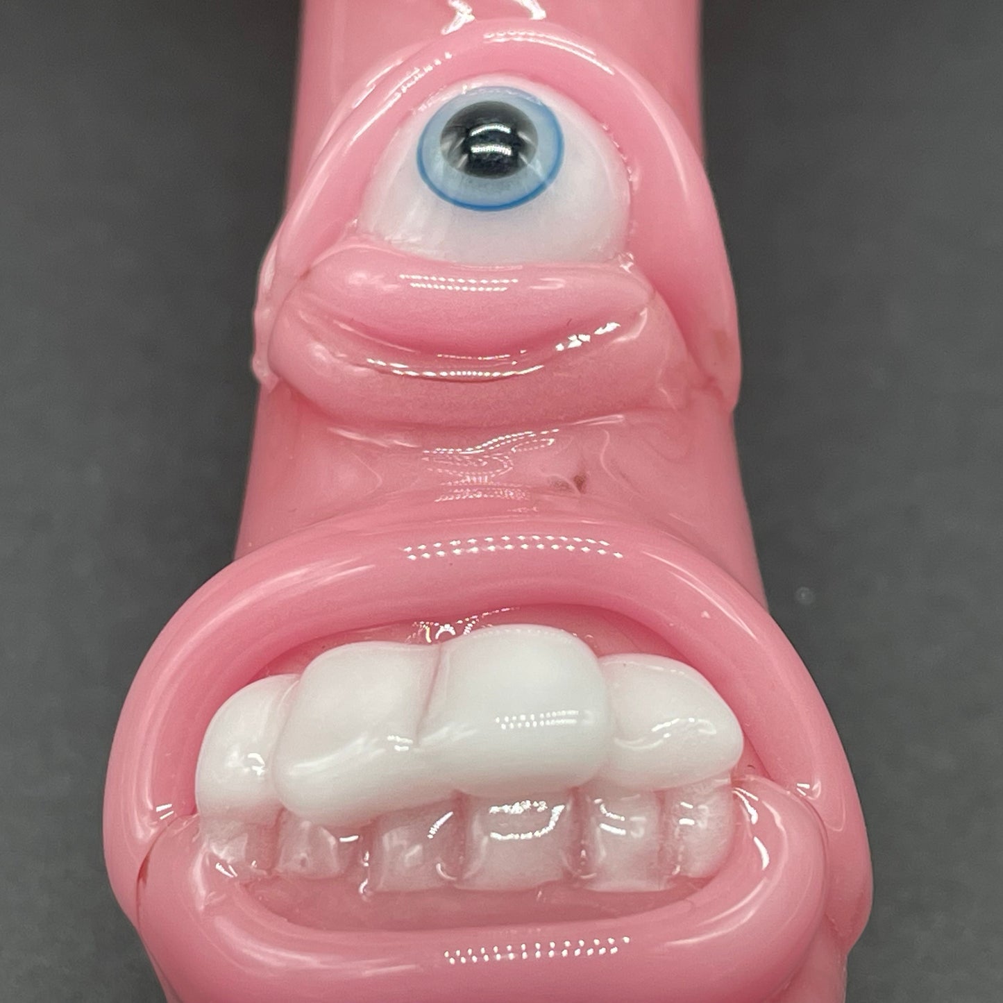 Pink evil eye bubbler by Leviathan Glass - artisan detail
