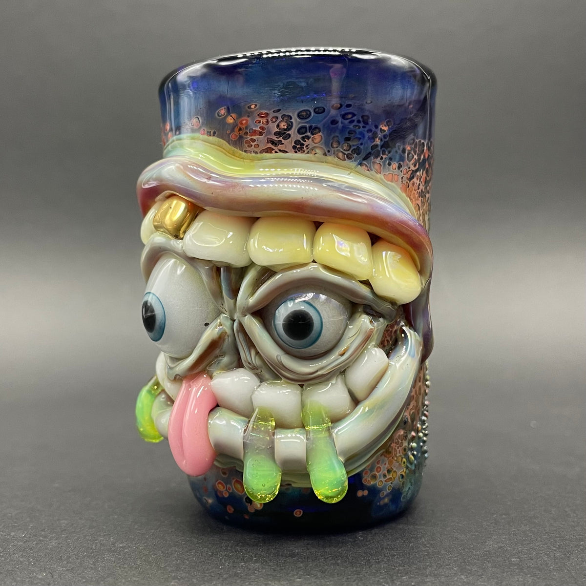 Close-up of Hungry eyes monster shot glass - handcrafted glass