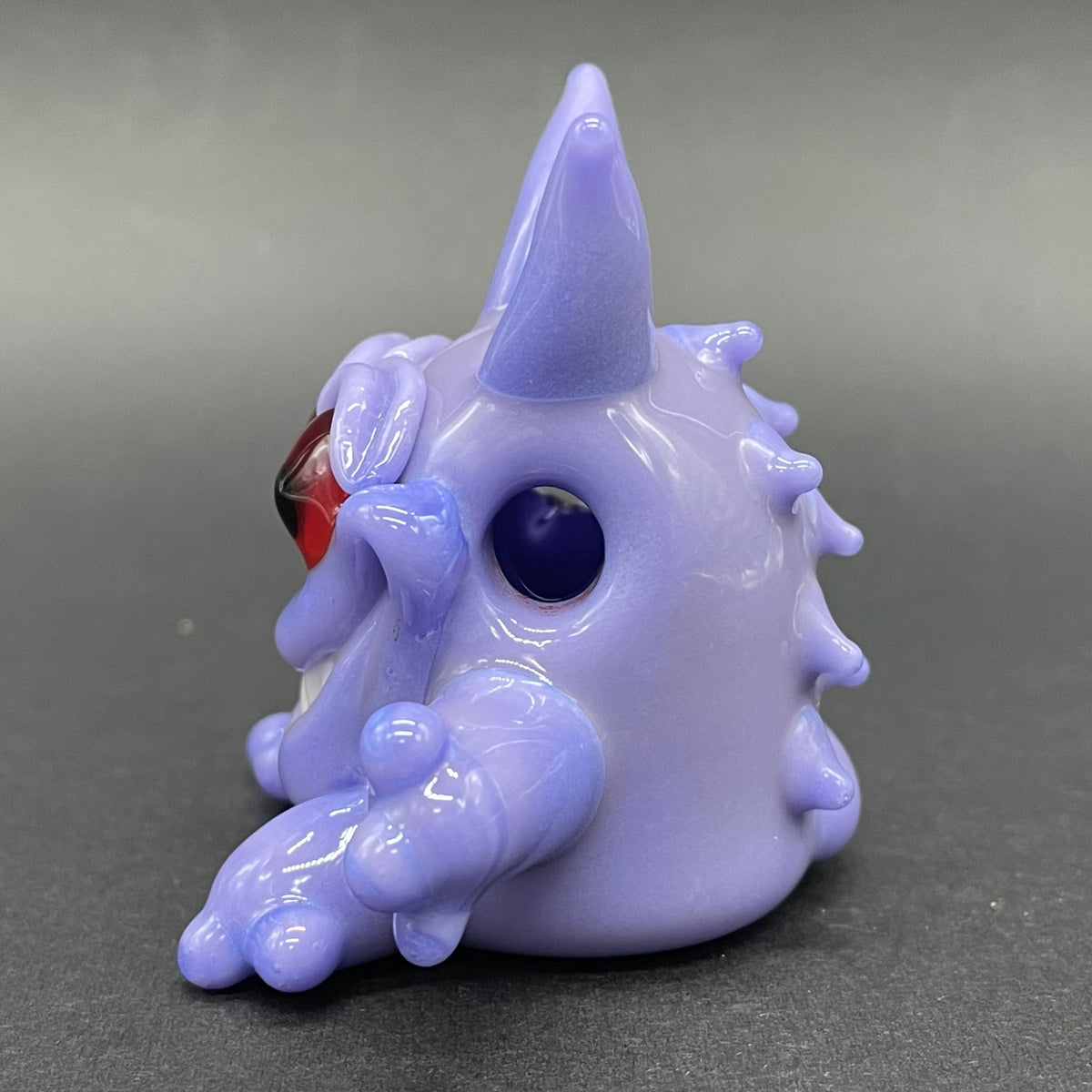 Gengar Pokémon handblown glass pendant - periwinkle purple Gengar sculpture, large red glass eyes, white teeth, clawed hands and feet, silver rope chain - Leviathan Glass