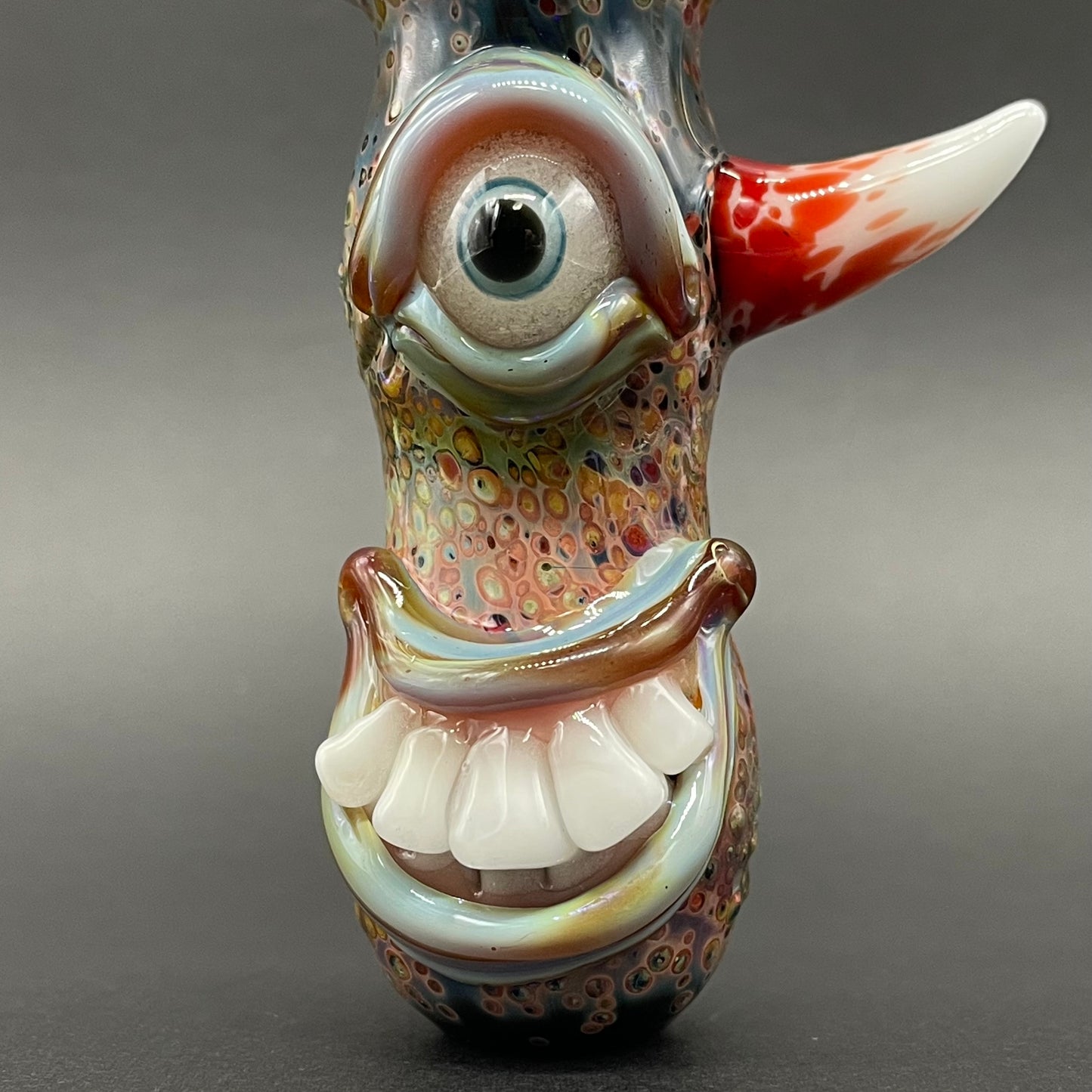 Close-up of Frit Cyclops Spoon - handcrafted glass