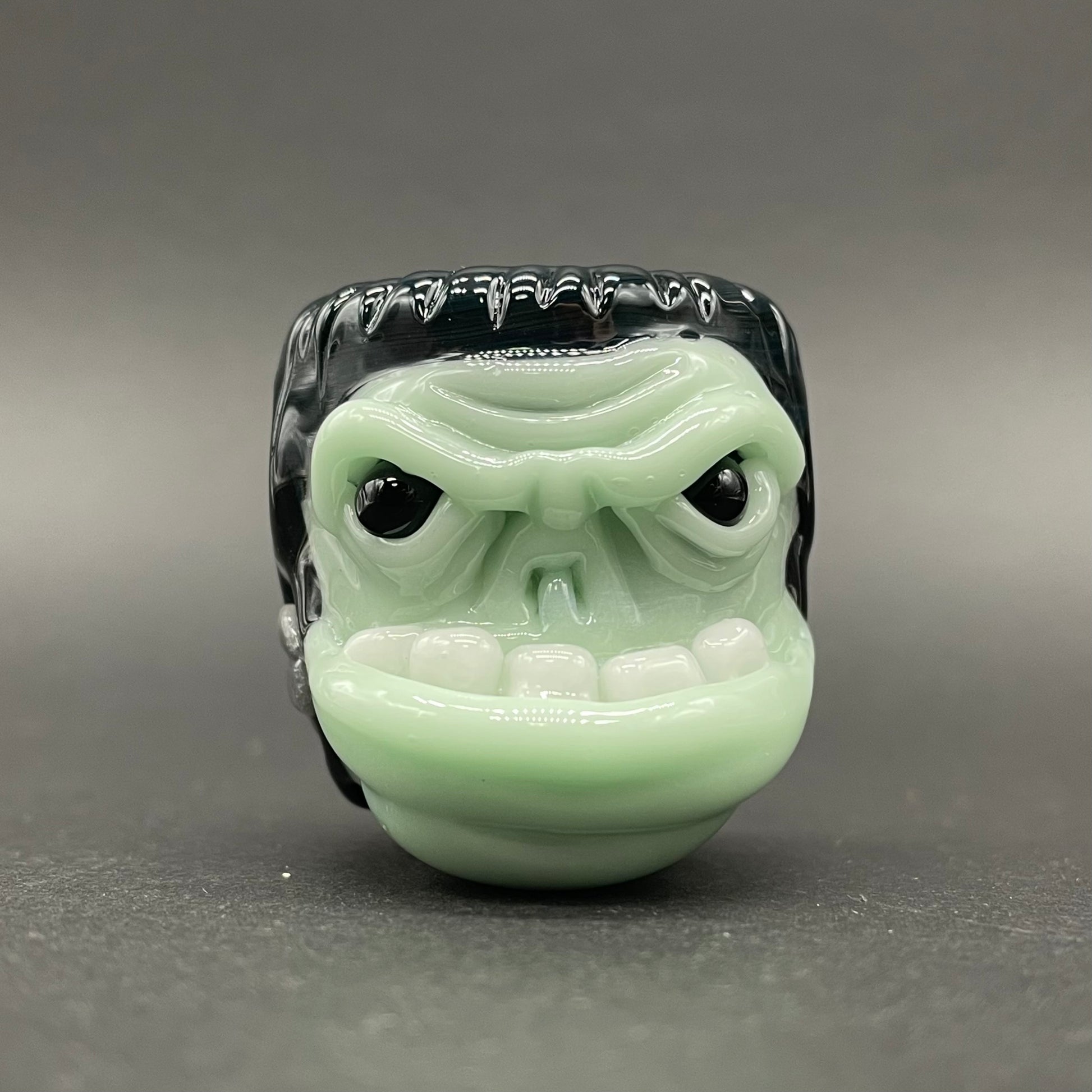 Hand-blown glass Glass Frankenstein pendant by Leviathan Glass