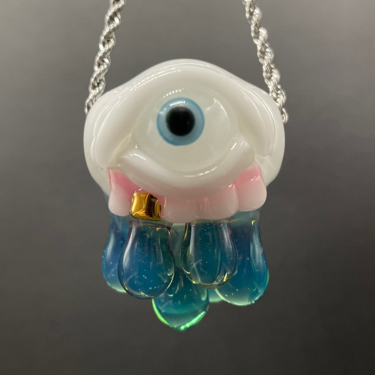 Eye of the storm glass pendant