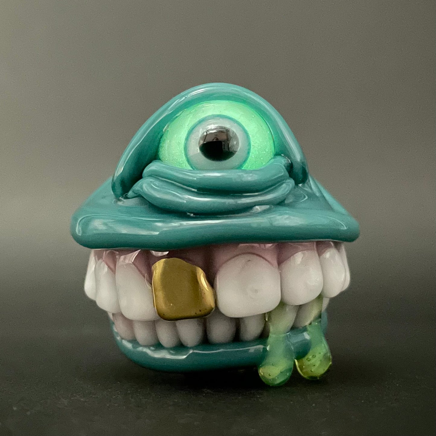 Grinning like a fool glass pendant