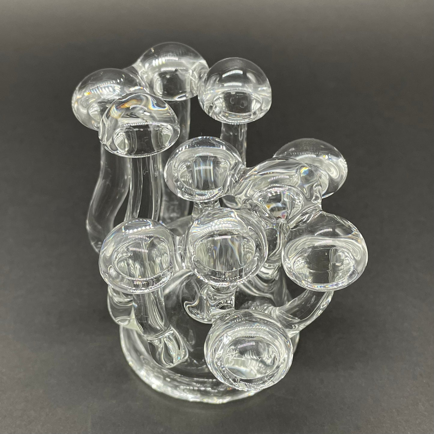 Close-up of Handblown Clear Glass Mushroom Sculpture Psychedelic Cluster Art Piece - handcrafted glass