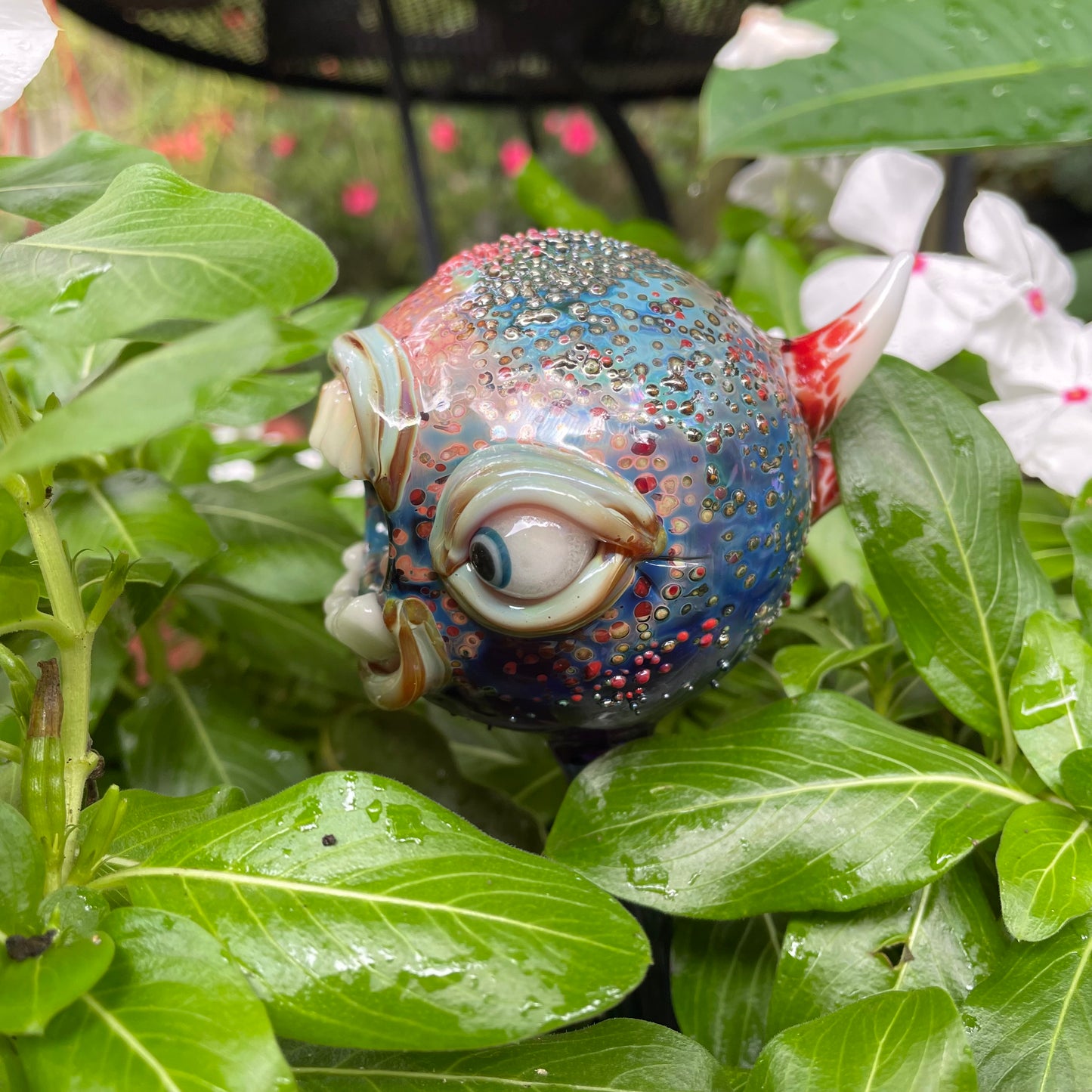Hand blown glass monster watering globe