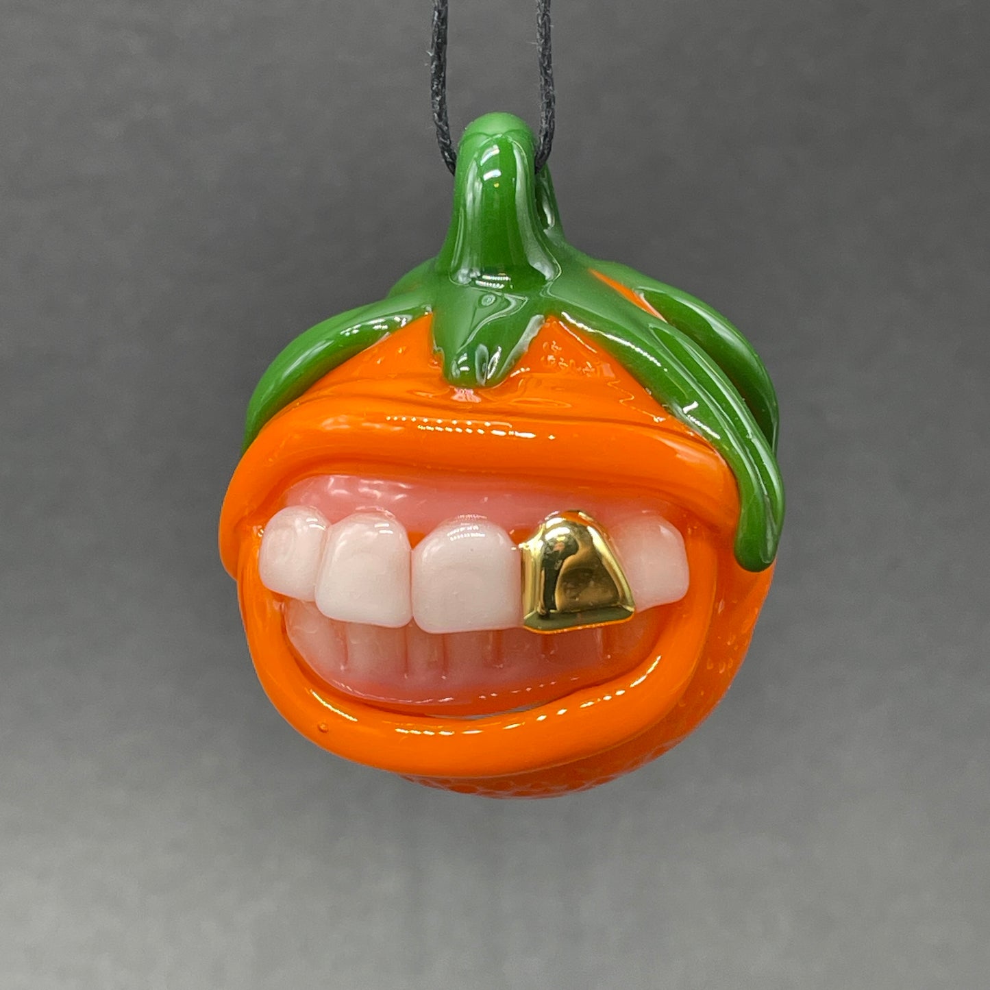 Premium Toothy orange pendant - collectible glass art