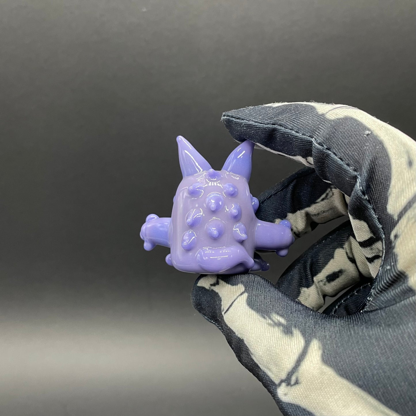 Gengar Pokémon handblown glass pendant - periwinkle purple Gengar sculpture, large red glass eyes, white teeth, clawed hands and feet, silver rope chain - Leviathan Glass