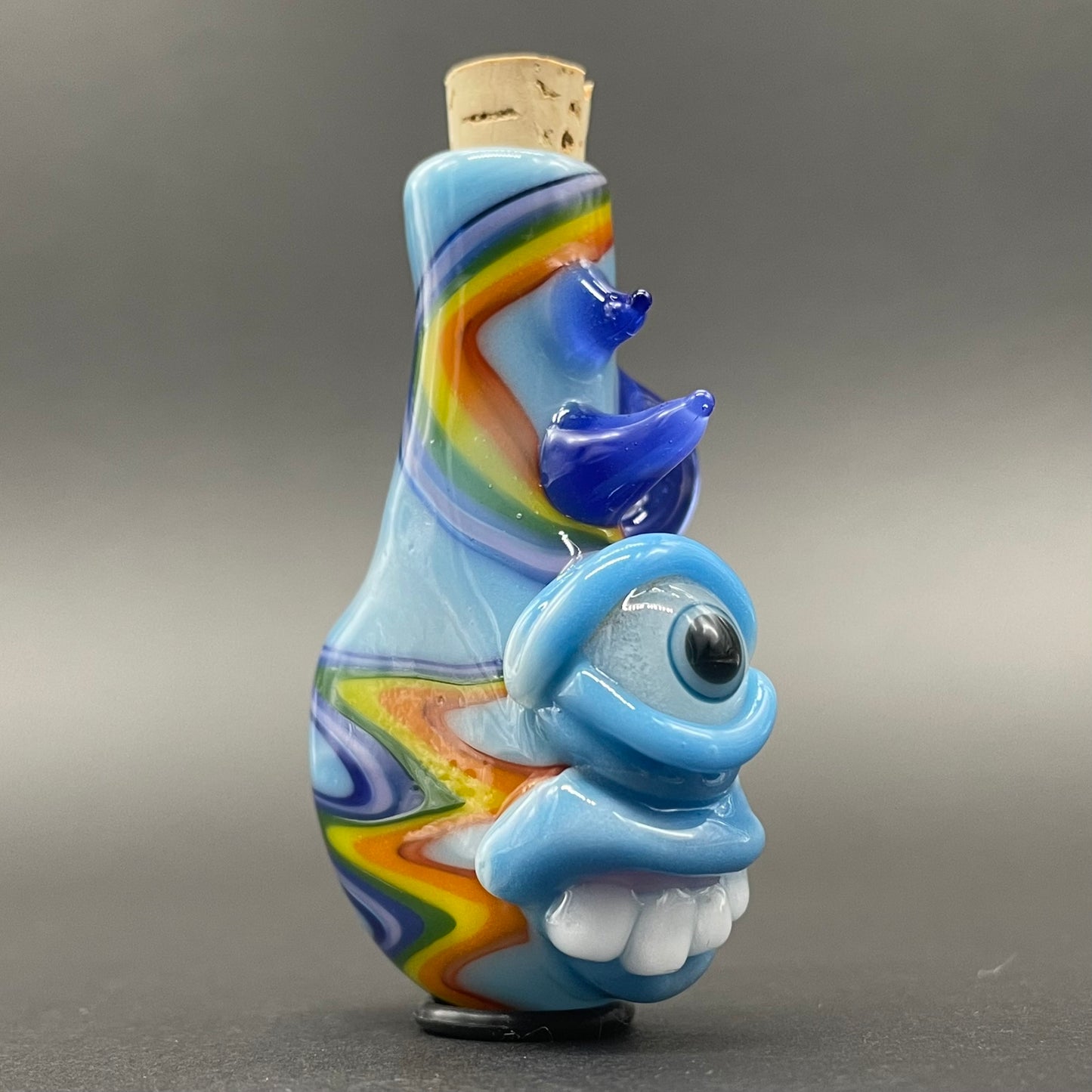 Rainbow cork bottle pendant detail view - premium glass art