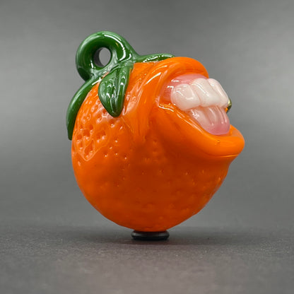 Toothy orange pendant by Leviathan Glass - artisan detail