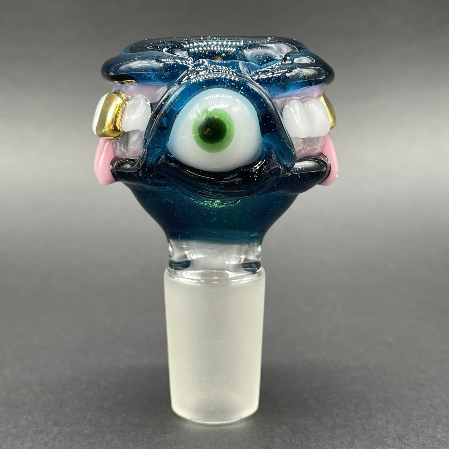Close-up of 18mm too many teeth slide - handcrafted glass