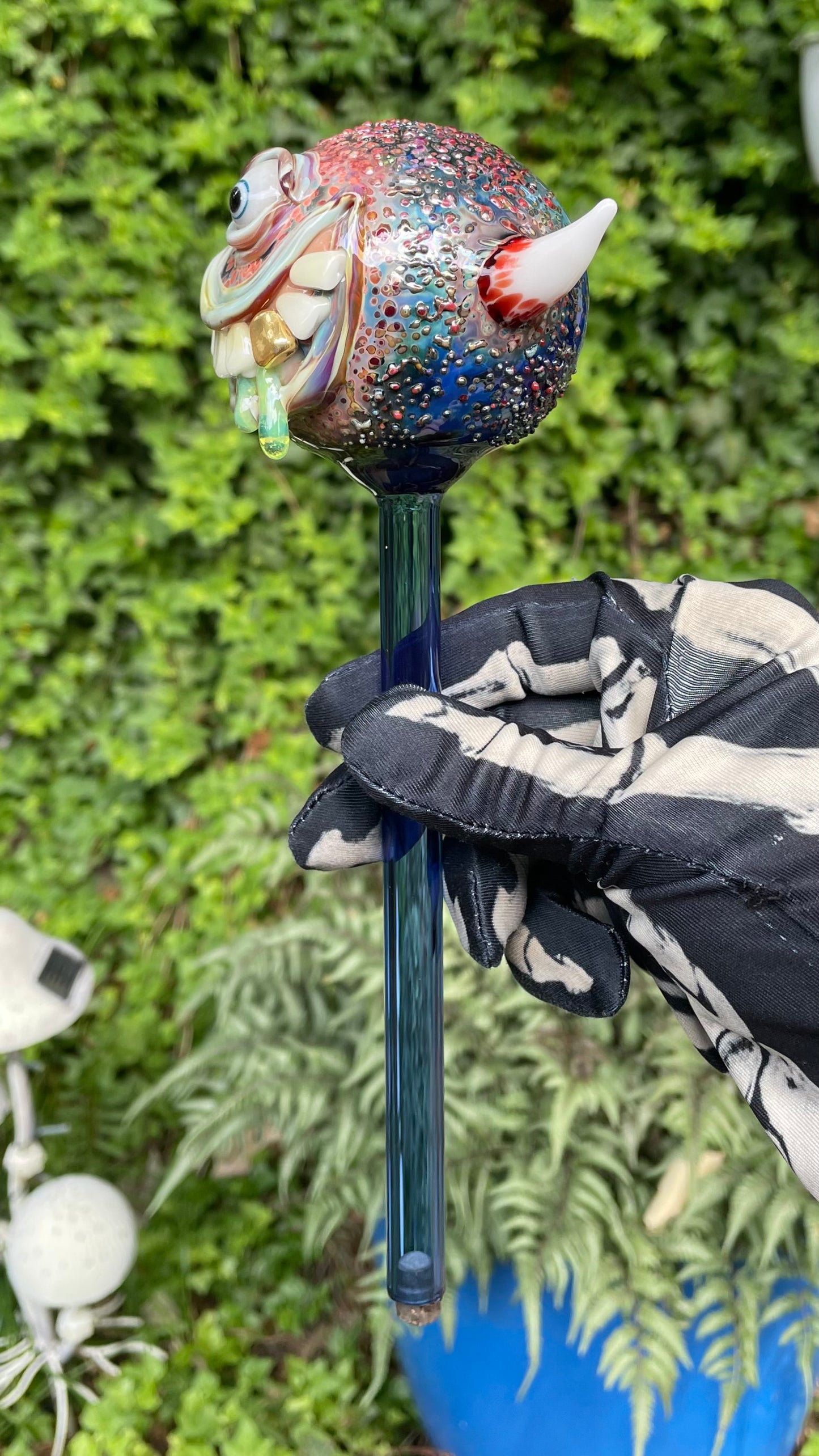 Hand blown glass monster watering globe