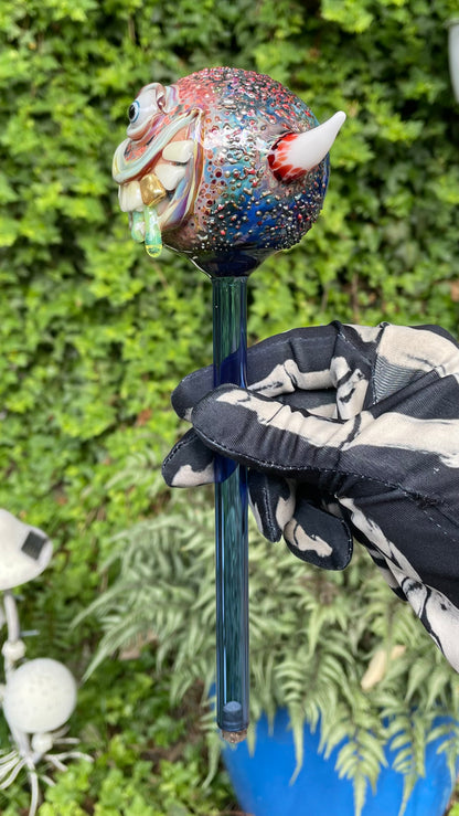 Hand blown glass monster watering globe