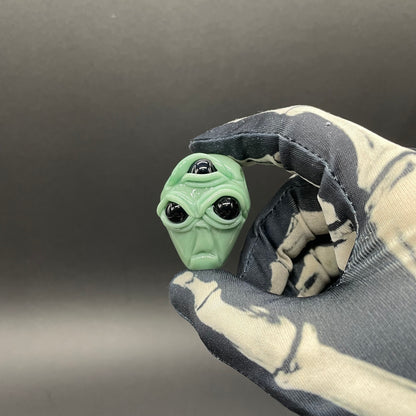 Time manipulating three eye glass alien pendant