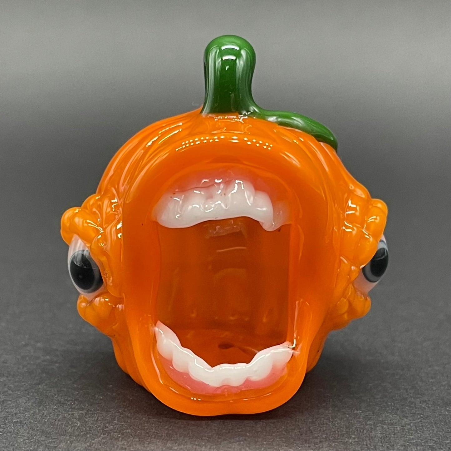 Close-up of screaming jack-o’-lantern - handcrafted glass