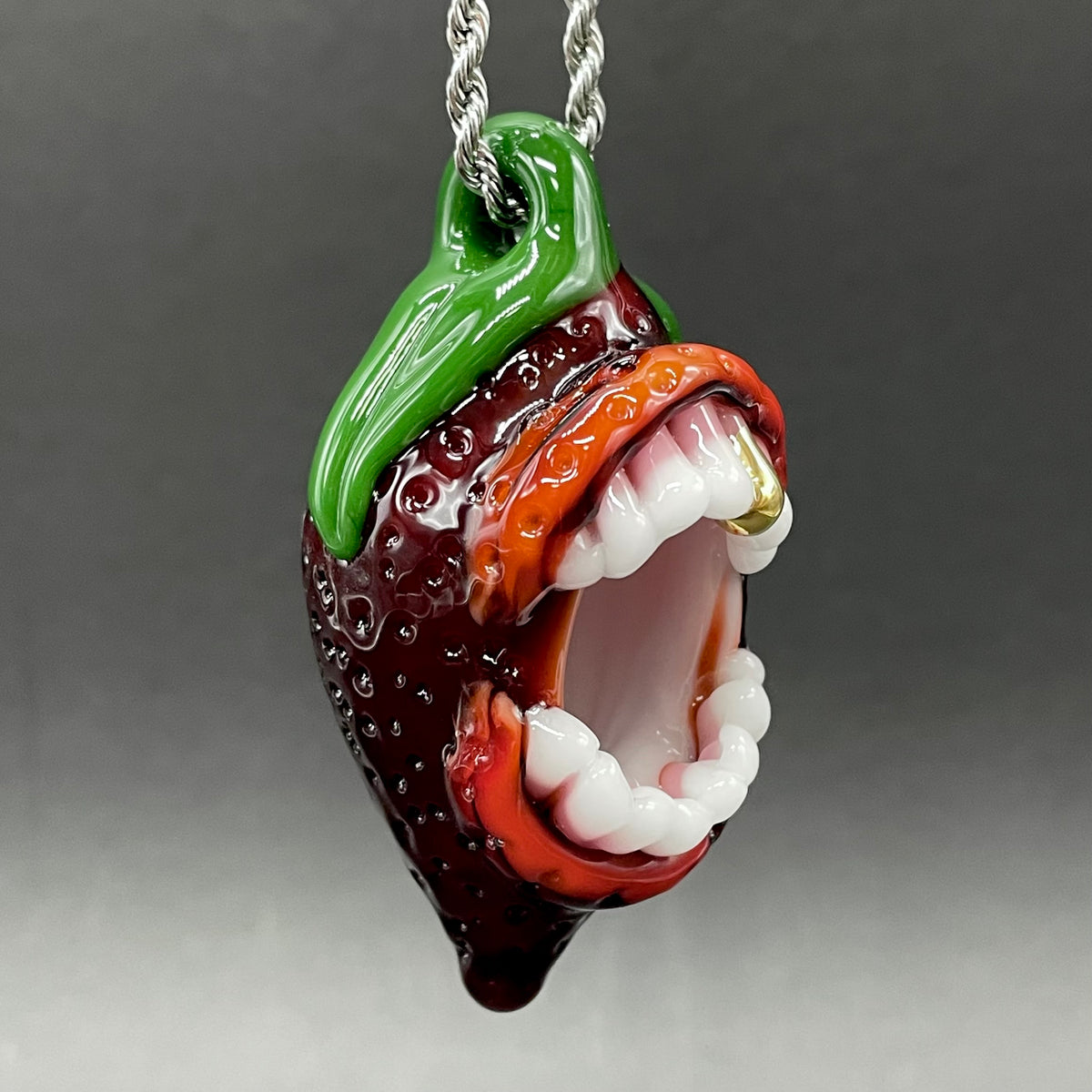 Screaming strawberry glass pendant