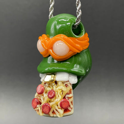 Close-up of Glass Ninja Turtle Pendant – Handmade Michelangelo Pizza Necklace, TMNT Fan Jewelry - handcrafted glass