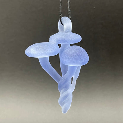 Blacklight mushroom pendant by Leviathan Glass - artisan detail
