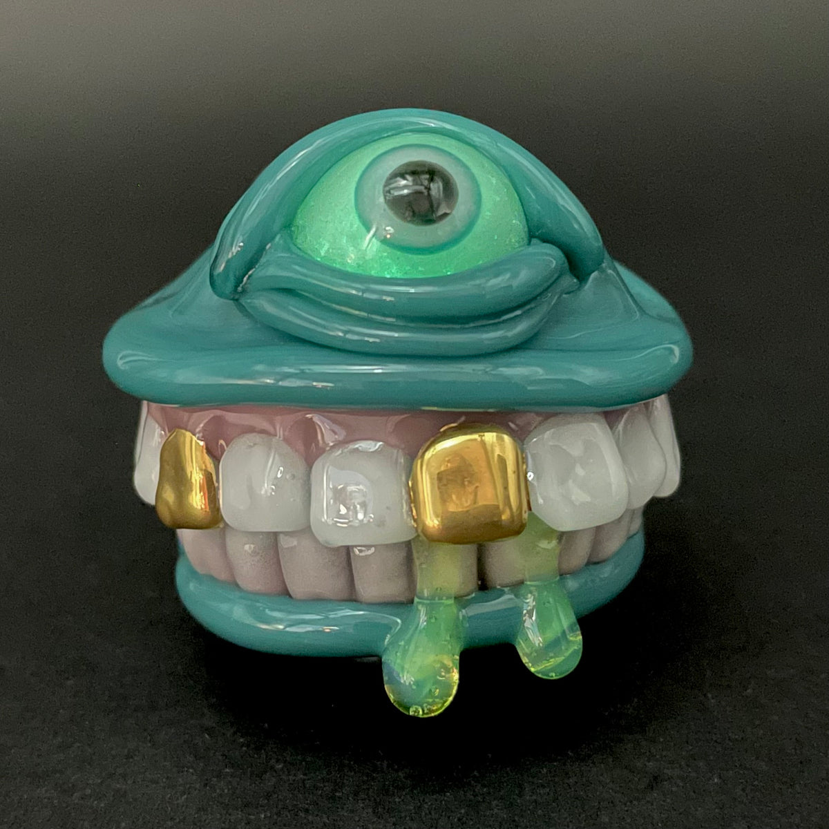 Grinning Like a Fool handblown glass pendant - oversized grinning monster face, white teeth, gold tooth, opal accents, silver rope chain - Leviathan Glass