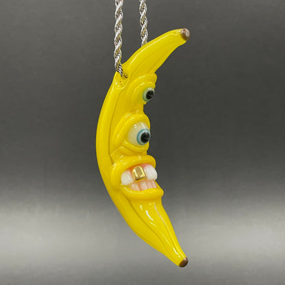 Grinning glass banana pendant