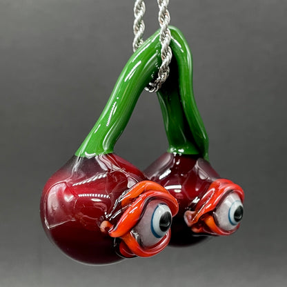 Cherry flavored glass eye pendant
