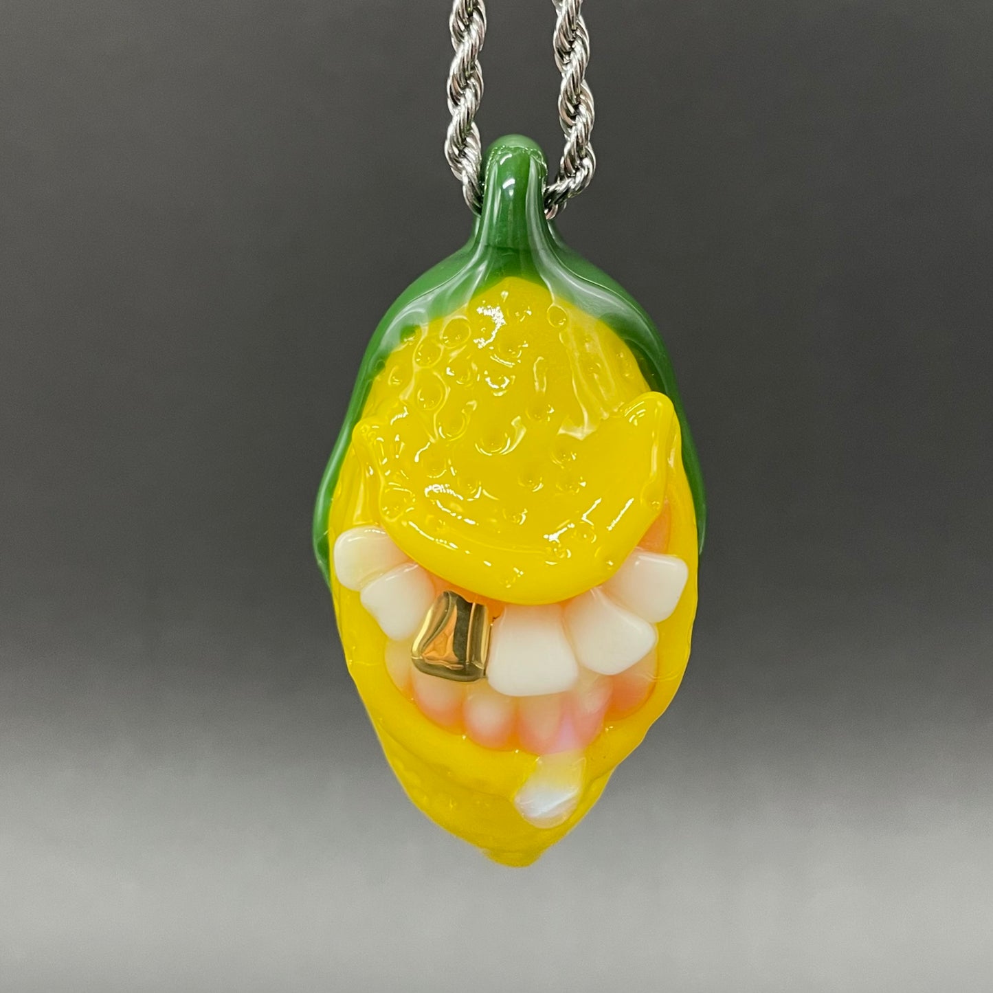 Grinning lemon pendant