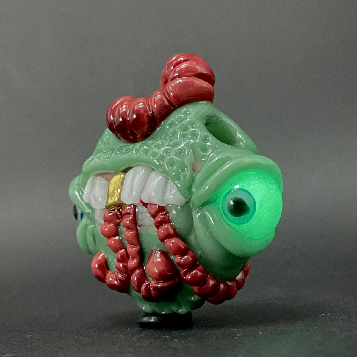 Worm eater pendant