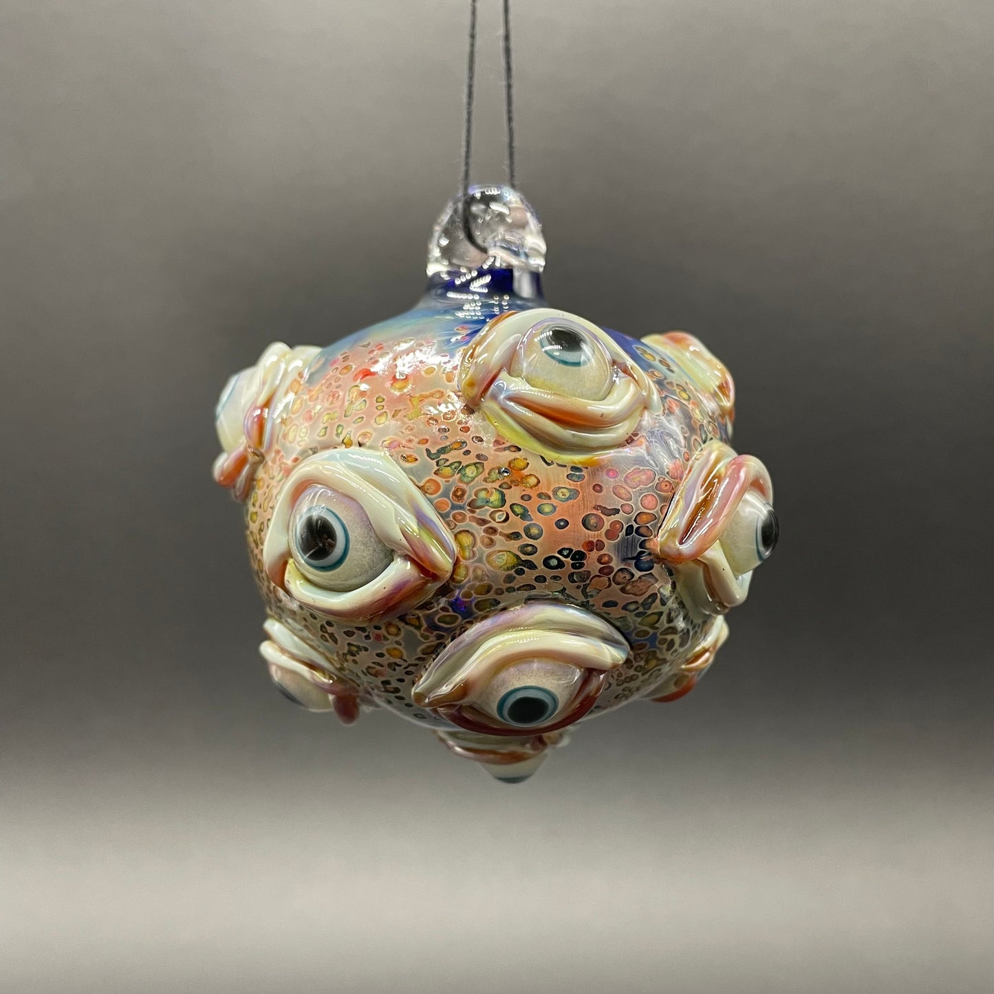 Hand-blown glass All seeing Argus ornament by Leviathan Glass