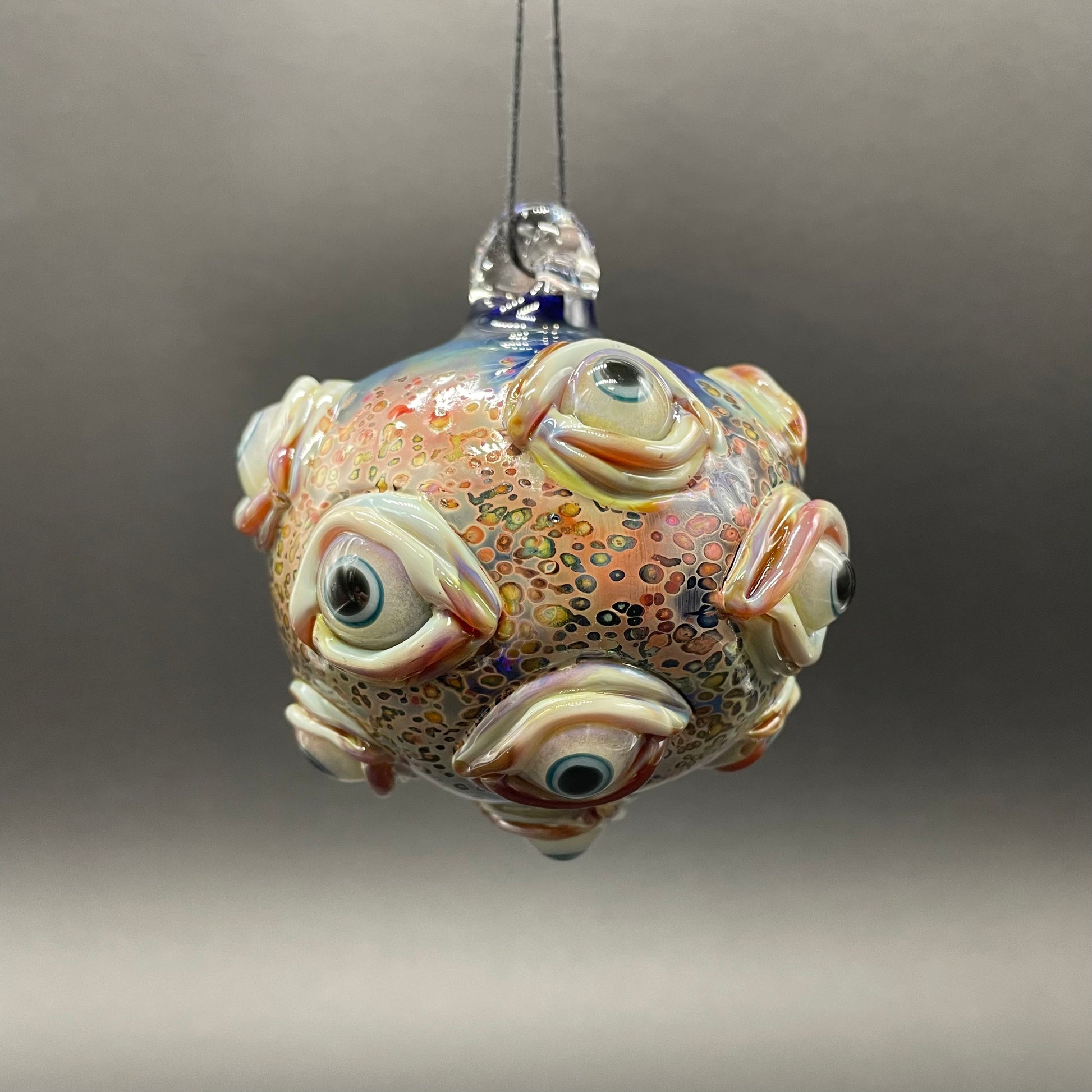 Hand-blown glass All seeing Argus ornament by Leviathan Glass