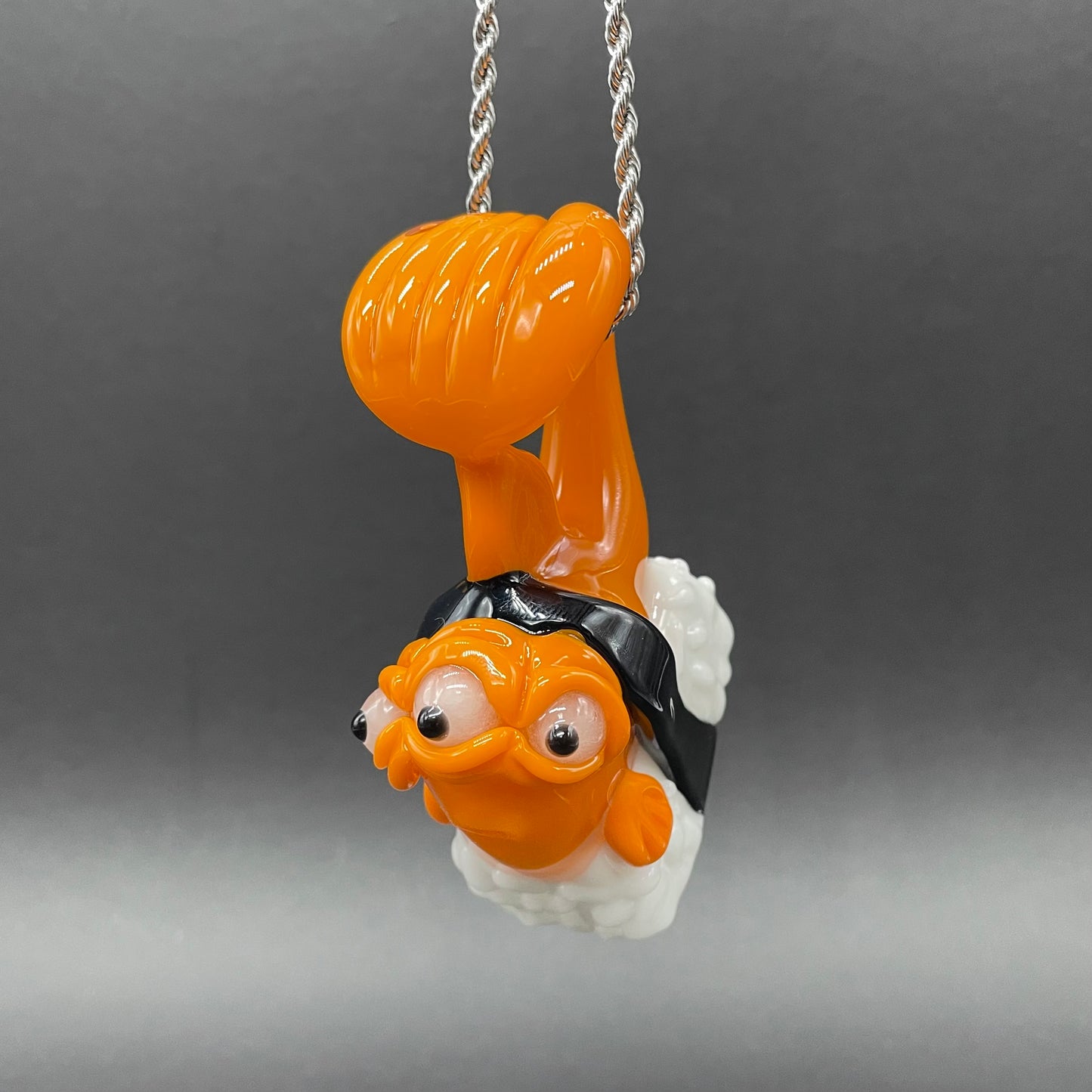 Mutant three eyed fish sushi glass pendant