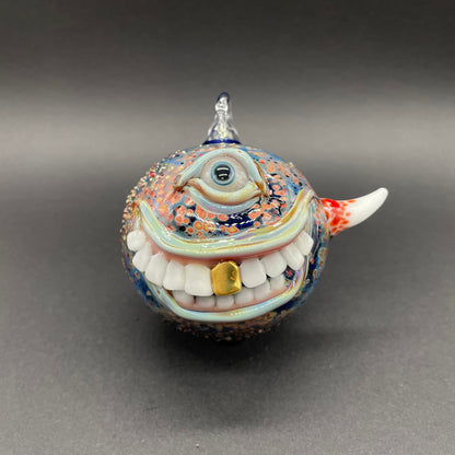 Hand-blown glass Smiling cyclops ornament by Leviathan Glass