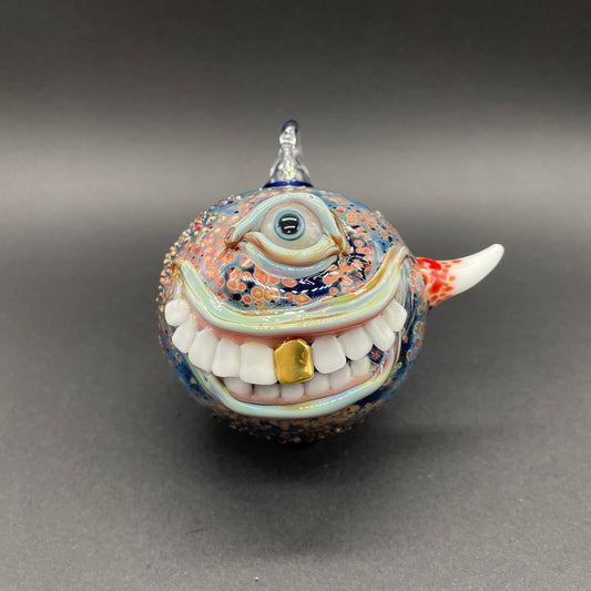 Hand-blown glass Smiling cyclops ornament by Leviathan Glass