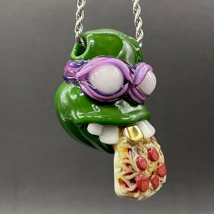 Close-up of Glass Donatello ninja turtle pendant - handcrafted glass