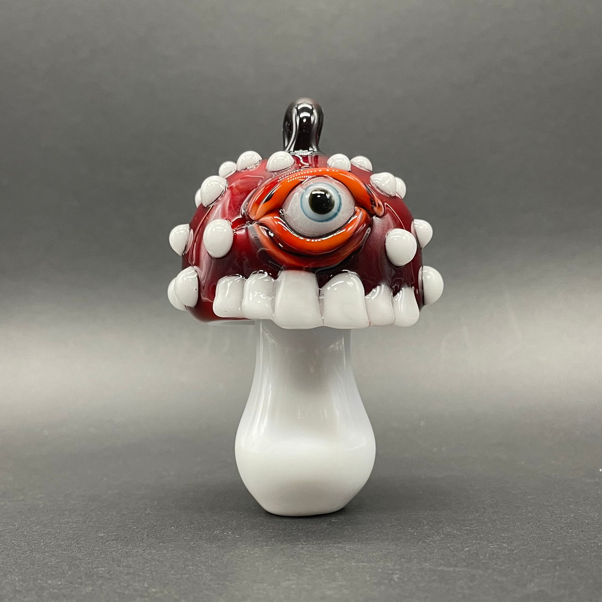 Hand-blown glass Cyclops mushroom ornament by Leviathan Glass